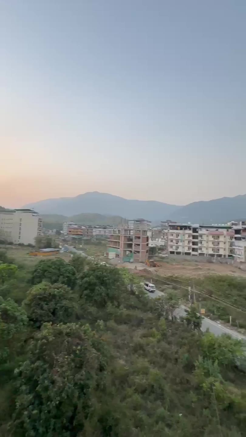 Video of the green valley and hill view around EDU NEST in Bidholi